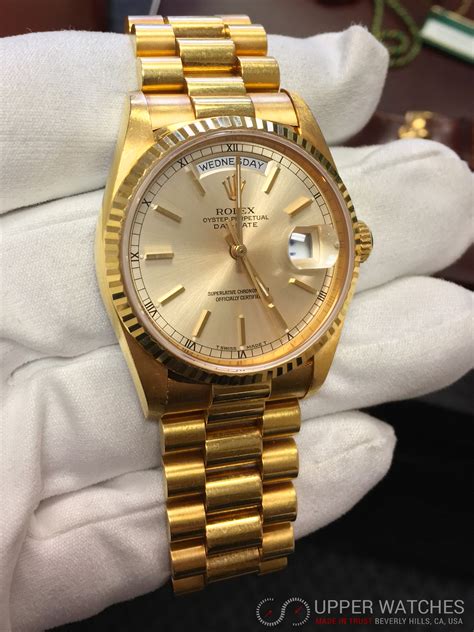 rolex day date gold president price